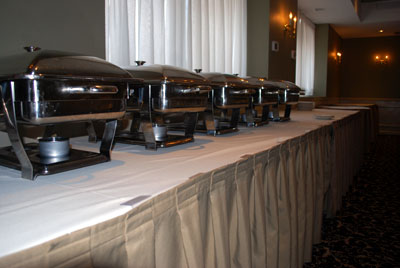 Food is served hot and fresh in chafing dishes at a Manor Inn banquet.